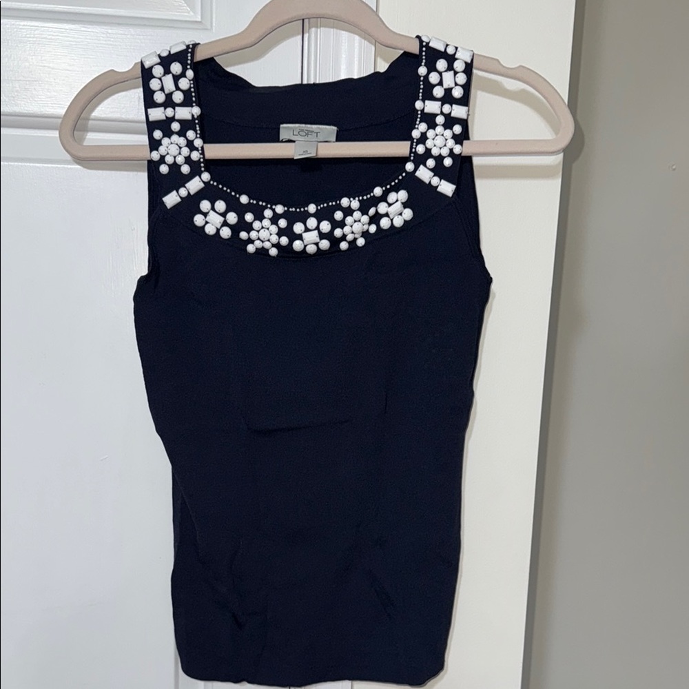 Blue tank top with white beaded work